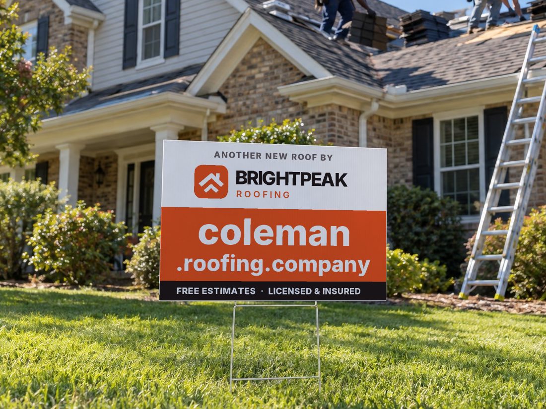 coleman.roofing.company on a yard sign in front of a house getting a new roof